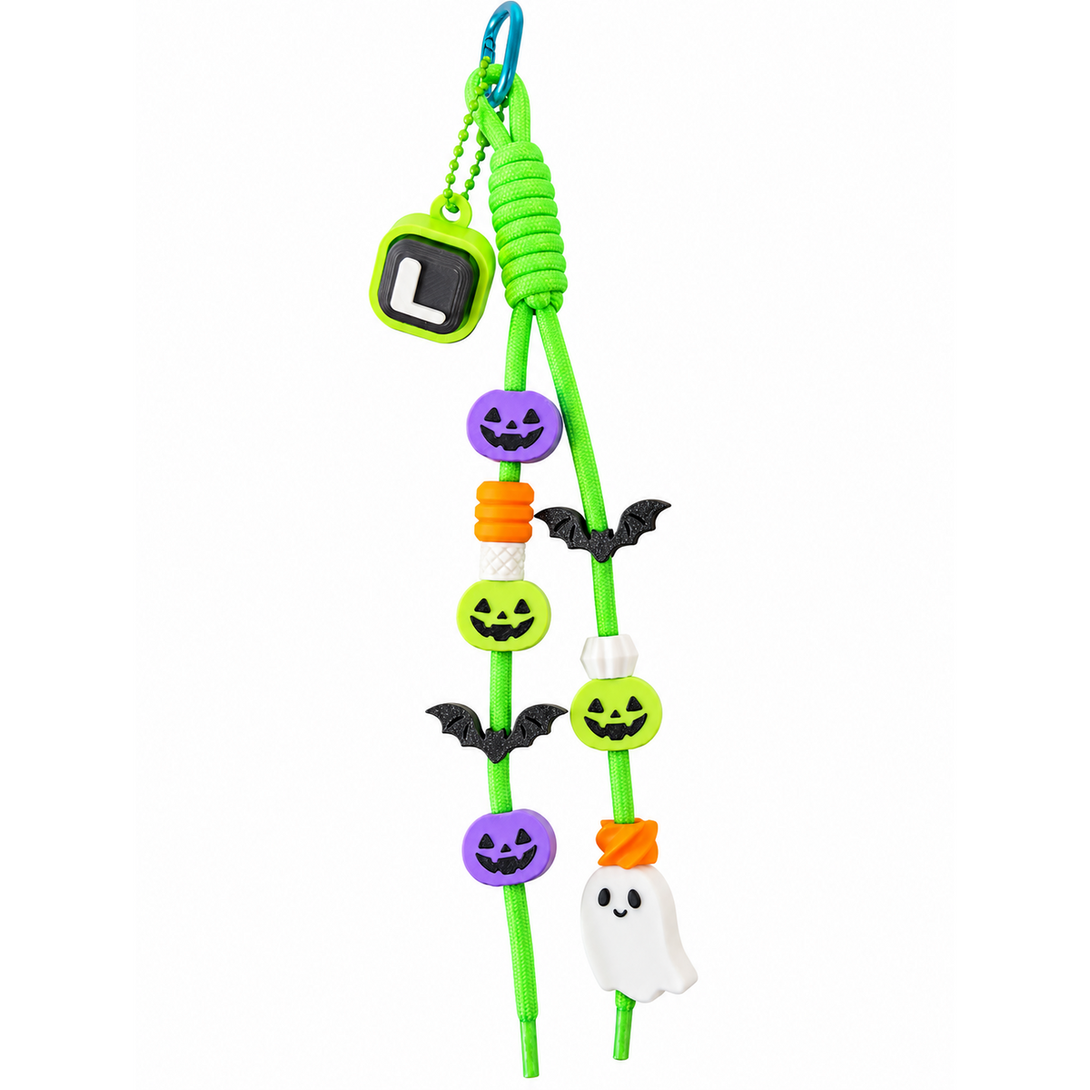 Assembled Boo & You Halloween keychain inspiration with green cord and colorful pumpkin, bat and ghost decorations on a white background.