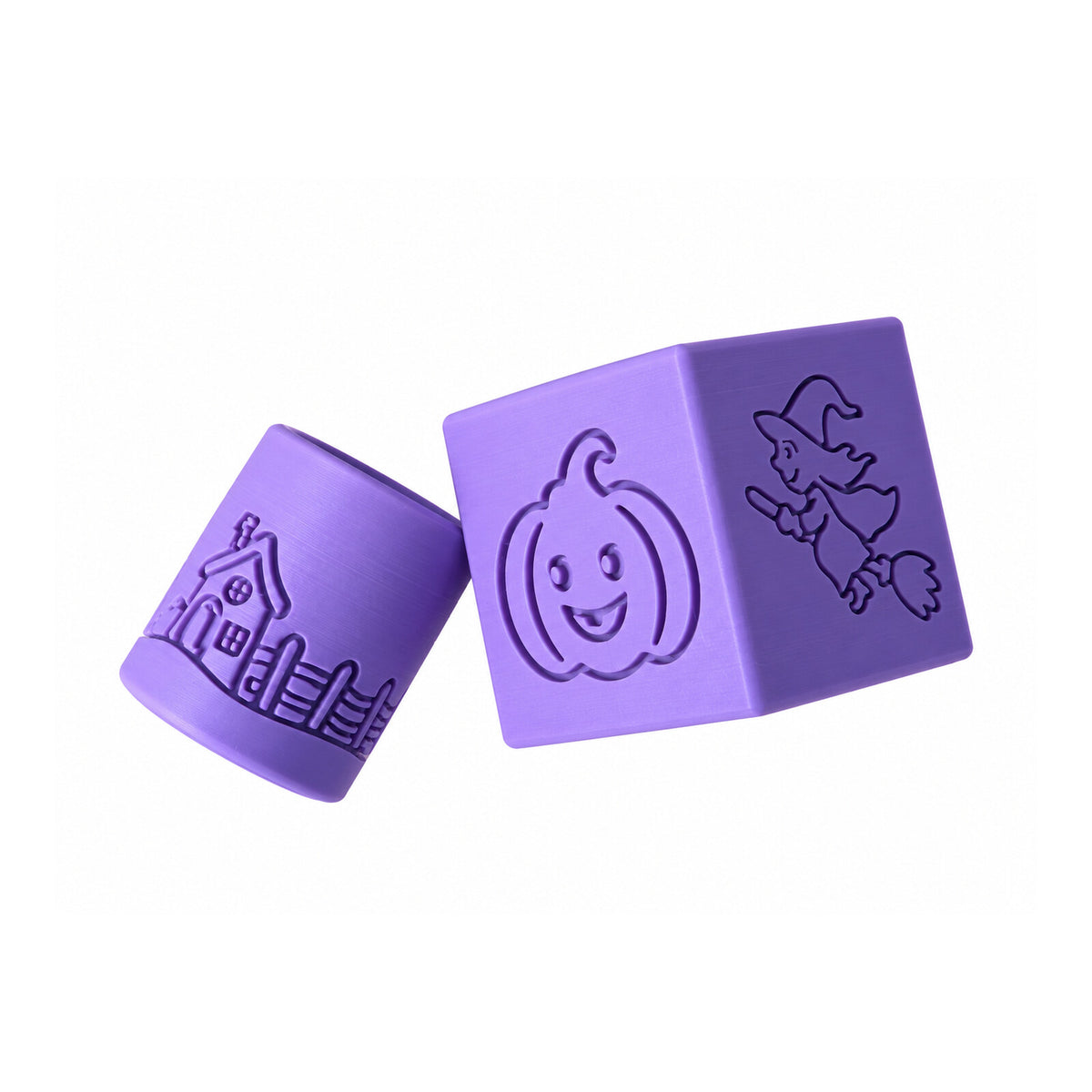 Purple Halloween stamp cube beside a cylindrical stamp