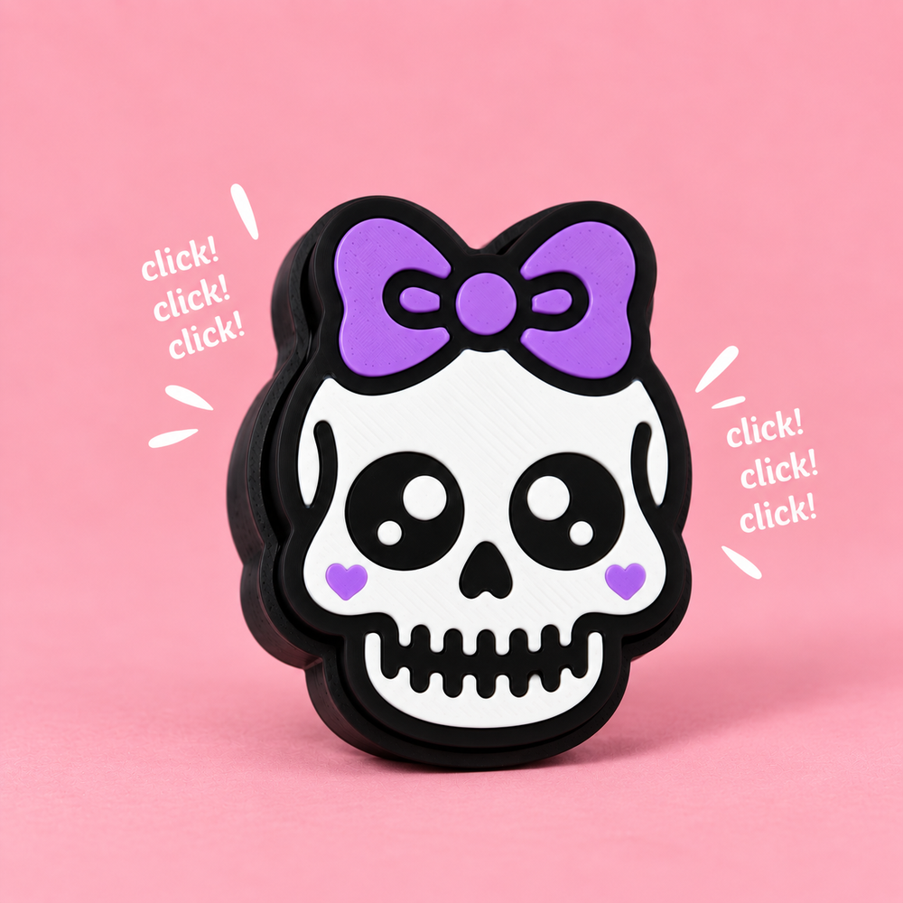 Sweet Skull Fidget Clicker on a pink background with click lettering