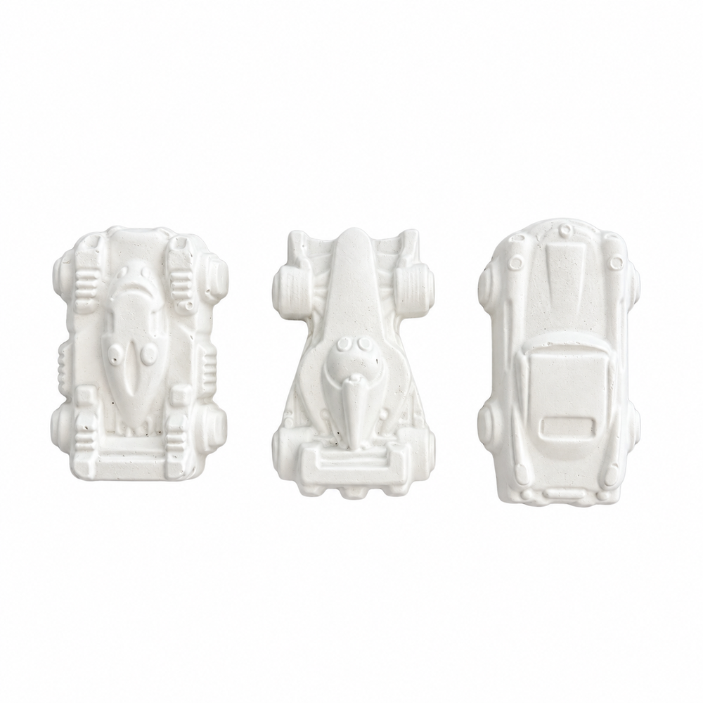 Three unpainted mini vehicle plaster shapes shown from above