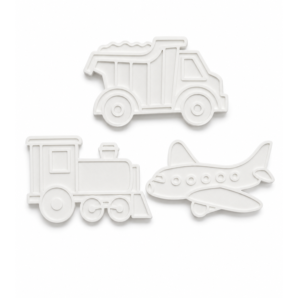 Unpainted airplane, train and dump truck shapes in the transport painting kit