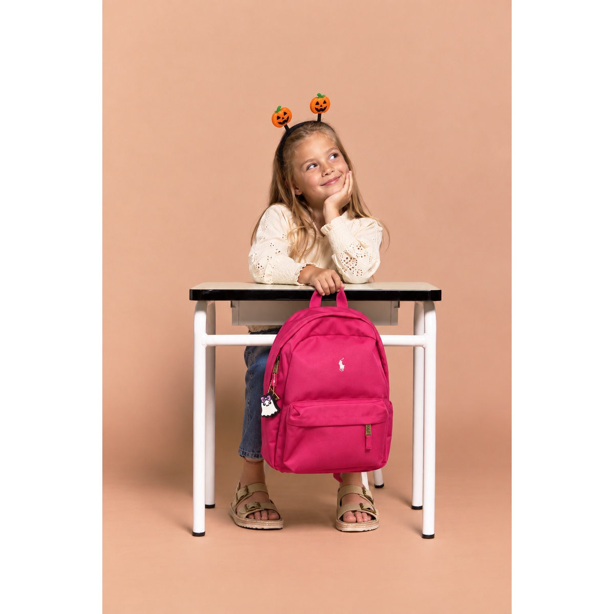 Boo Bow Ghost clicker shown on a pink school backpack; backpack not included