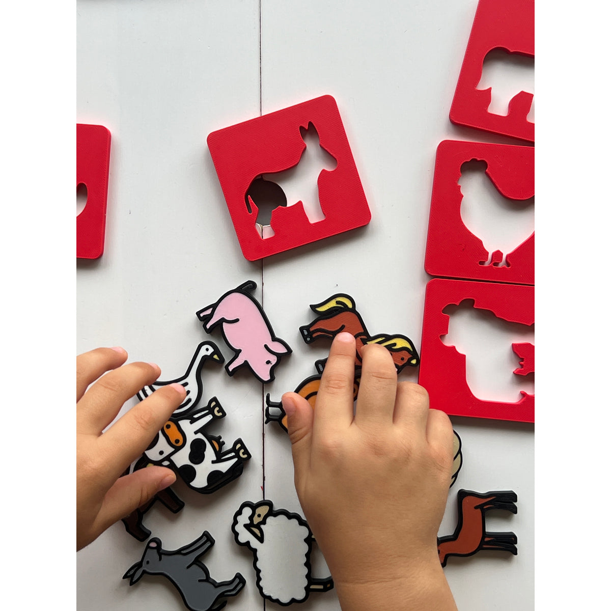 Farm Discovery 3D Puzzle real photo - child playing with pig, cow, and sheep tiles