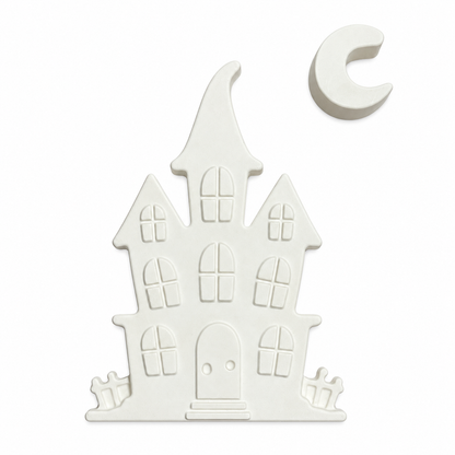 haunted house and crescent moon in unpainted plaster on a white background
